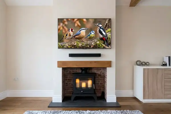 Multi-Room TV — TV & Soundbar Above Log Burner — Essex in Essex