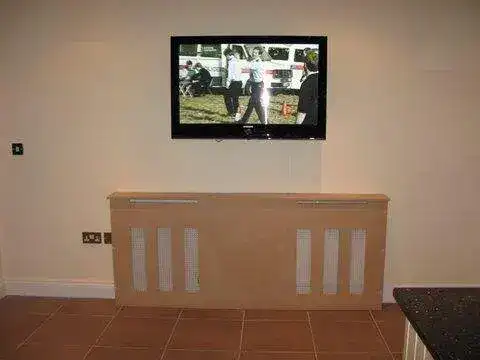 Plasterboard mounting using heavy-duty GripIt fixings for a 55" screen