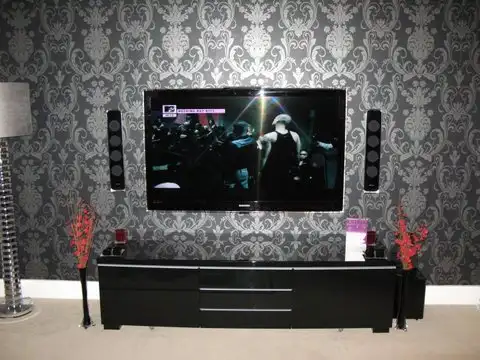 Home cinema with floor-standing speakers and large TV in Colchester