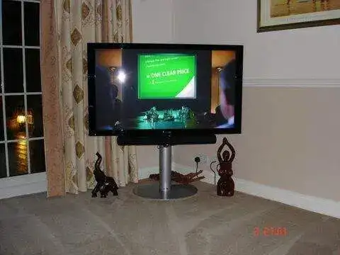 Wall-mounted display in a living room — example 2