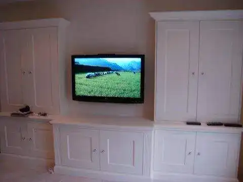 Mounted display above a fireplace — example 5