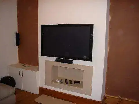 Wall-mounted display in a living room — example 9